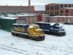 BNSF 2528 GP35U and MRL 112 GP9 sit outside the Talgo-LRC shops